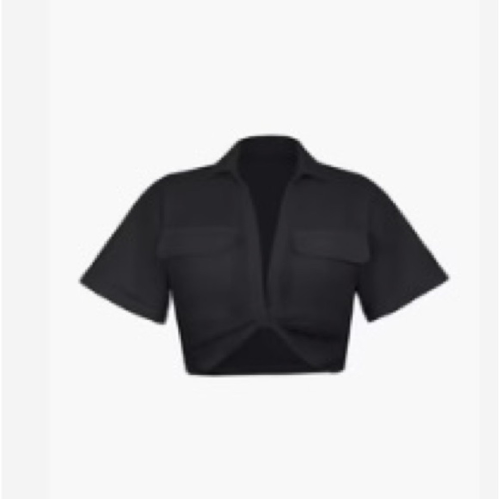 Flap pocket twist hem black crop top. NWOT.